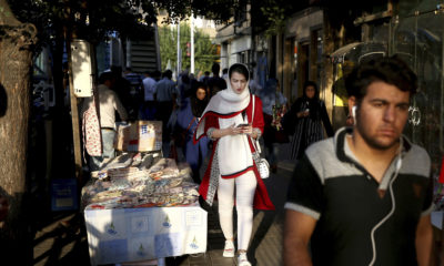 Photo of people walking in downtown Tehran, Iran.
