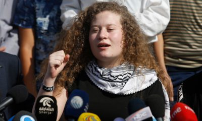 Photo of Ahed Tamimi speaking at a press conference
