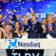 Photo of Brendan Kennedy, CEO and founder of British Columbia-based Tilray Inc., a major Canadian marijuana grower, leading cheers as confetti falls to celebrate