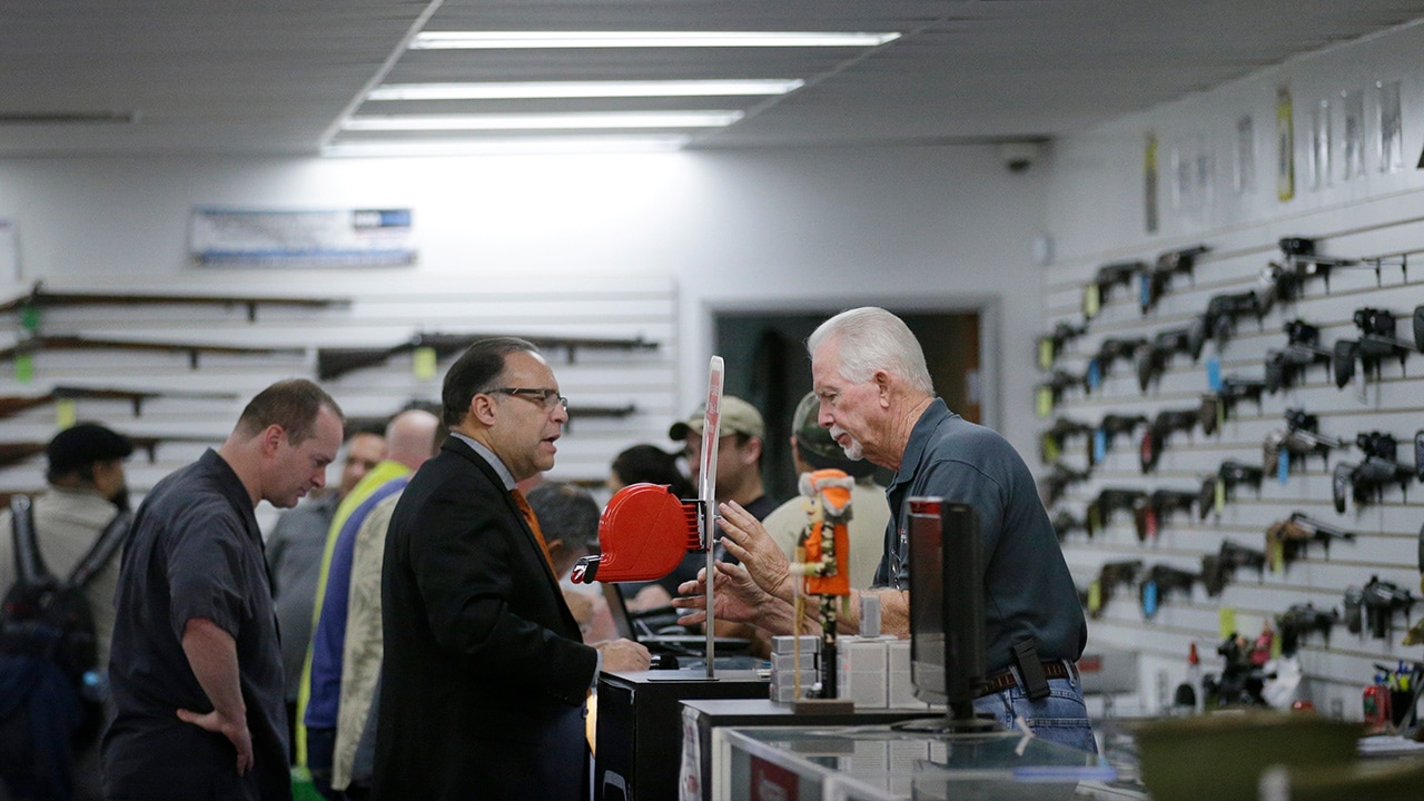 Photo of customers at Bullseye Sports gun shop