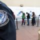 Photo of people crossing from Mexico into the U.S. in San Diego