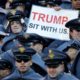 Photo of an Army cadet holding a sign for President Donald Trump