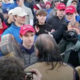 Photo of youths confronting Native American leader in front of the Lincoln Memorial