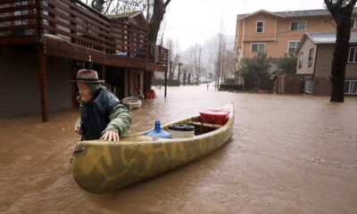 Photo of Jesse Hagan evacuating his apartment complex