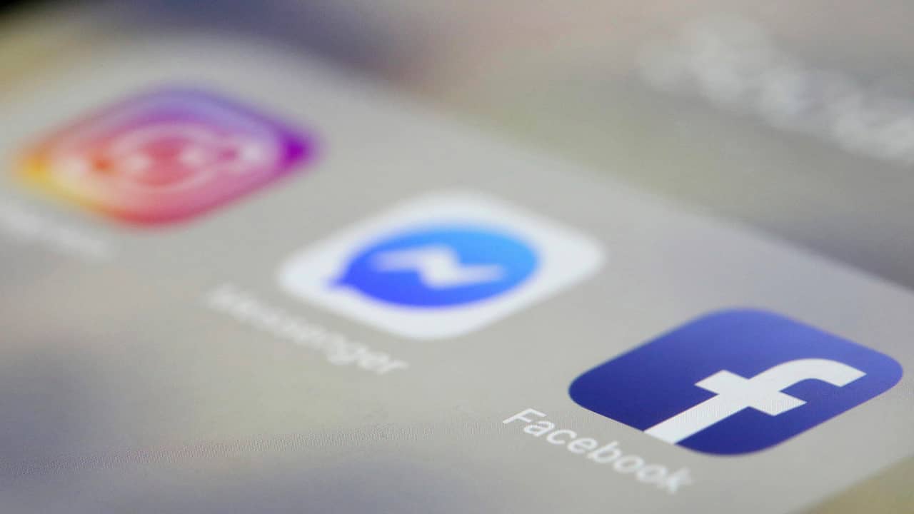 Photo of Facebook, Messenger, and Instagram apps displayed on an iPhone
