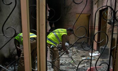 Photo of police officers collecting evidence