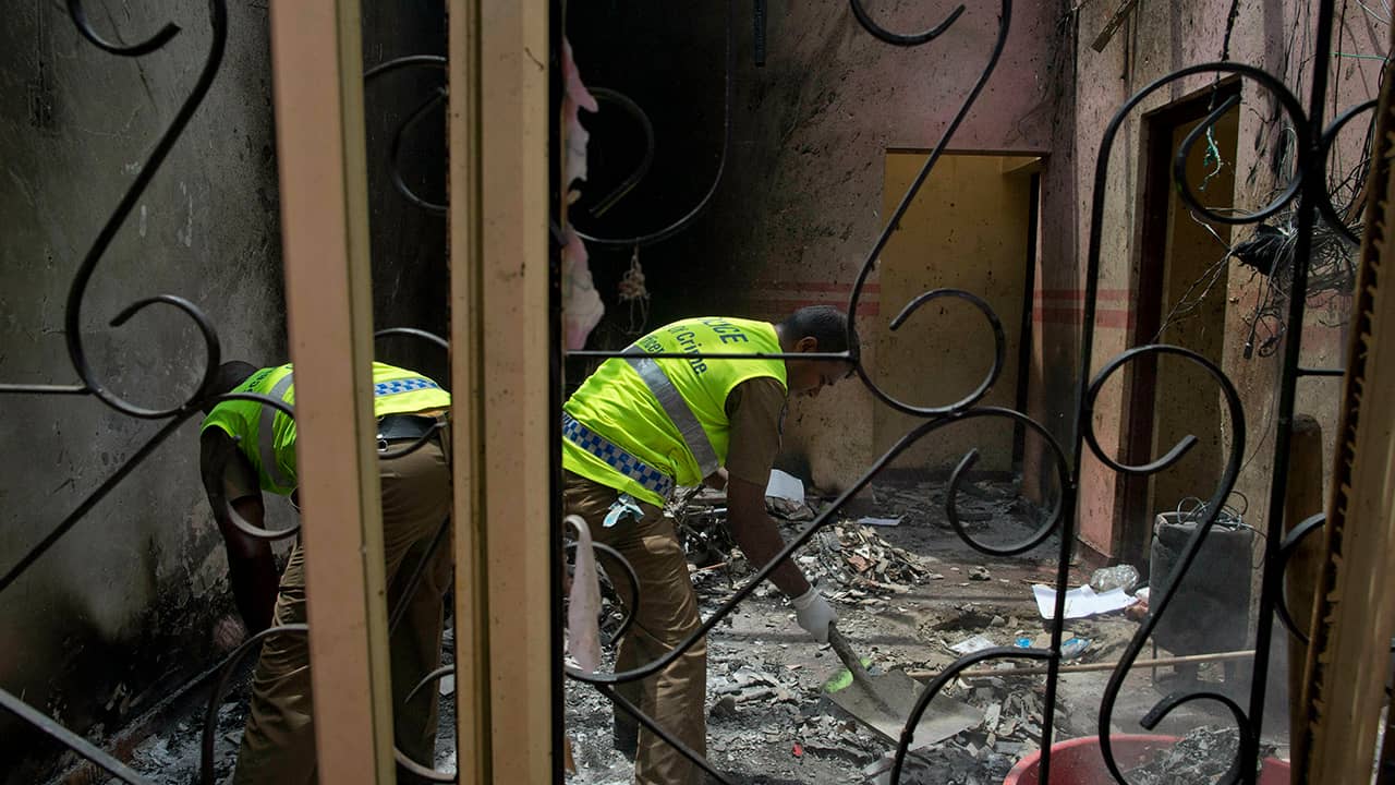Photo of police officers collecting evidence