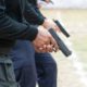 Photo of police with guns