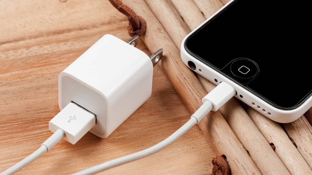 Photo of iPhone connected to a charger