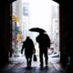 Photo of pedestrians passing beneath City Hall in Philadelphia