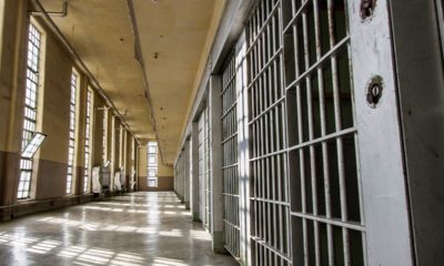 Photo of a prison hall and cells