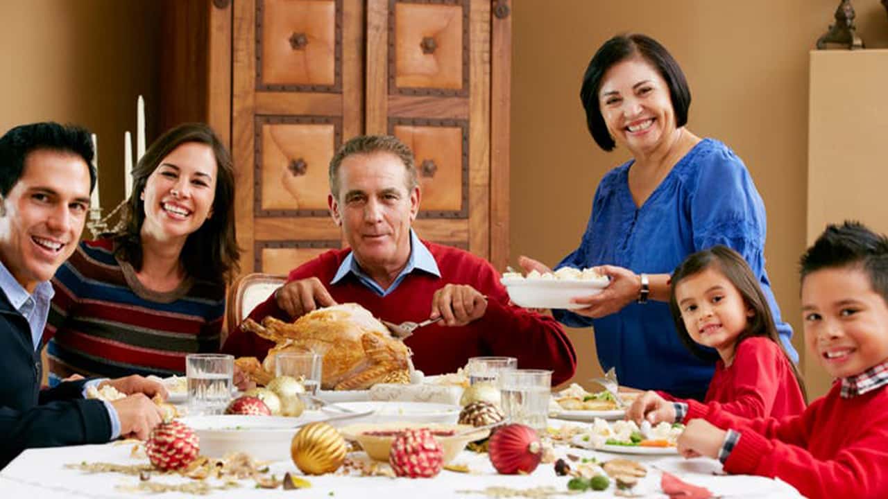 Photo of a family at Thanksgiving dinner