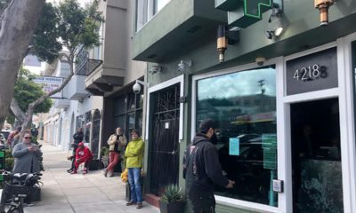 Photo of people waiting outside The Green Cross in San Francisco