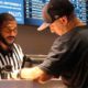 Photo of a man placing a sports bet