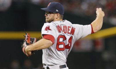 Photo of Boston Red Sox relief picture Marcus Walden delivering a pitch to the plate.